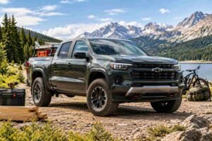 2026 Chevrolet Colorado midsize pickup truck for work and outdoor adventures on a rugged mountain trail.