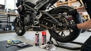Cleaning and lubricating a motorcycle drive chain during winter motorcycle maintenance