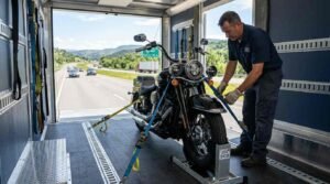 Motorcycle shipping in the USA with a motorcycle securely fastened inside a transport trailer